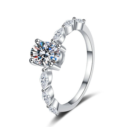 Pear Shaped Moissanite Ring with CZ white background product image