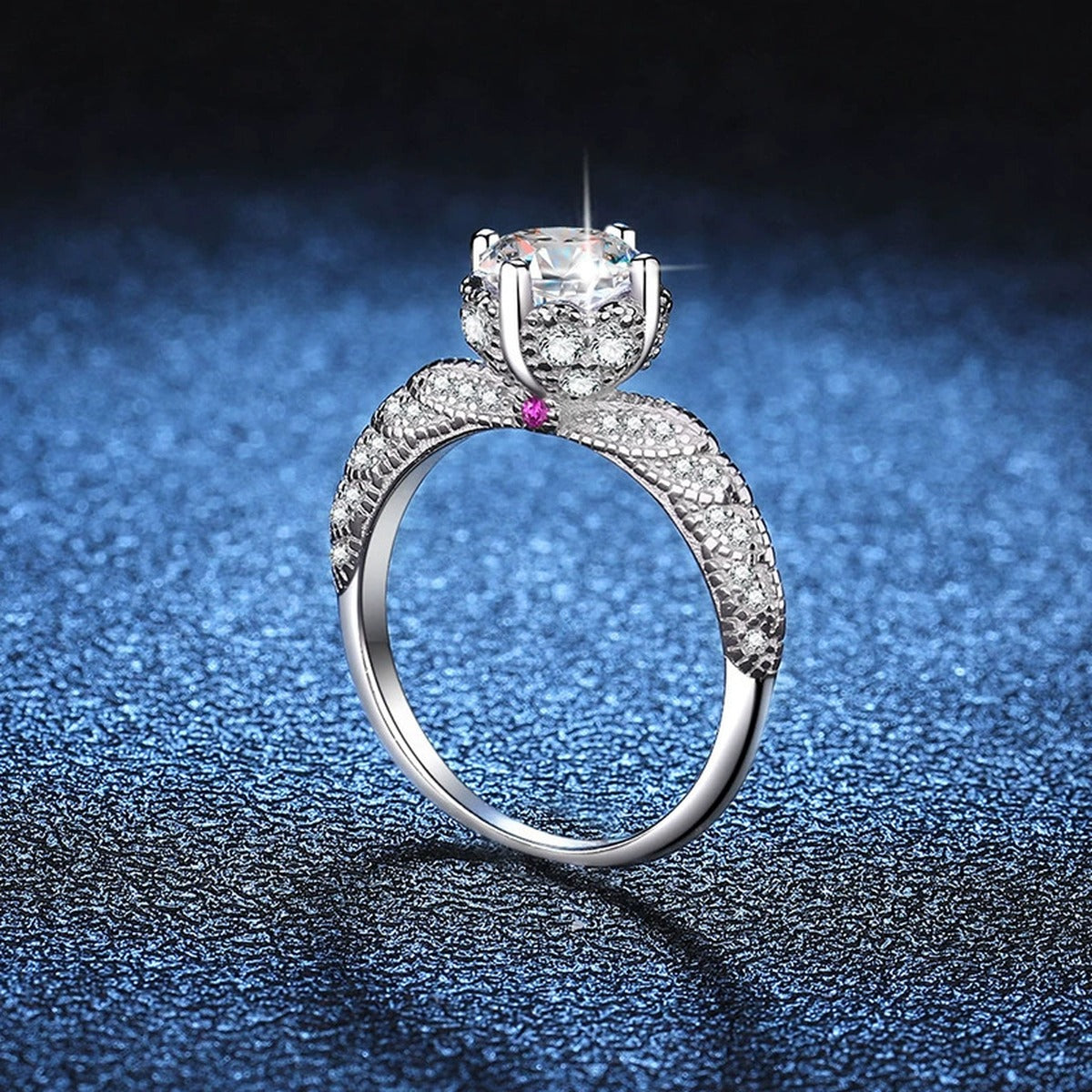 Round Moissanite Ring with Pink CZ blue background product view