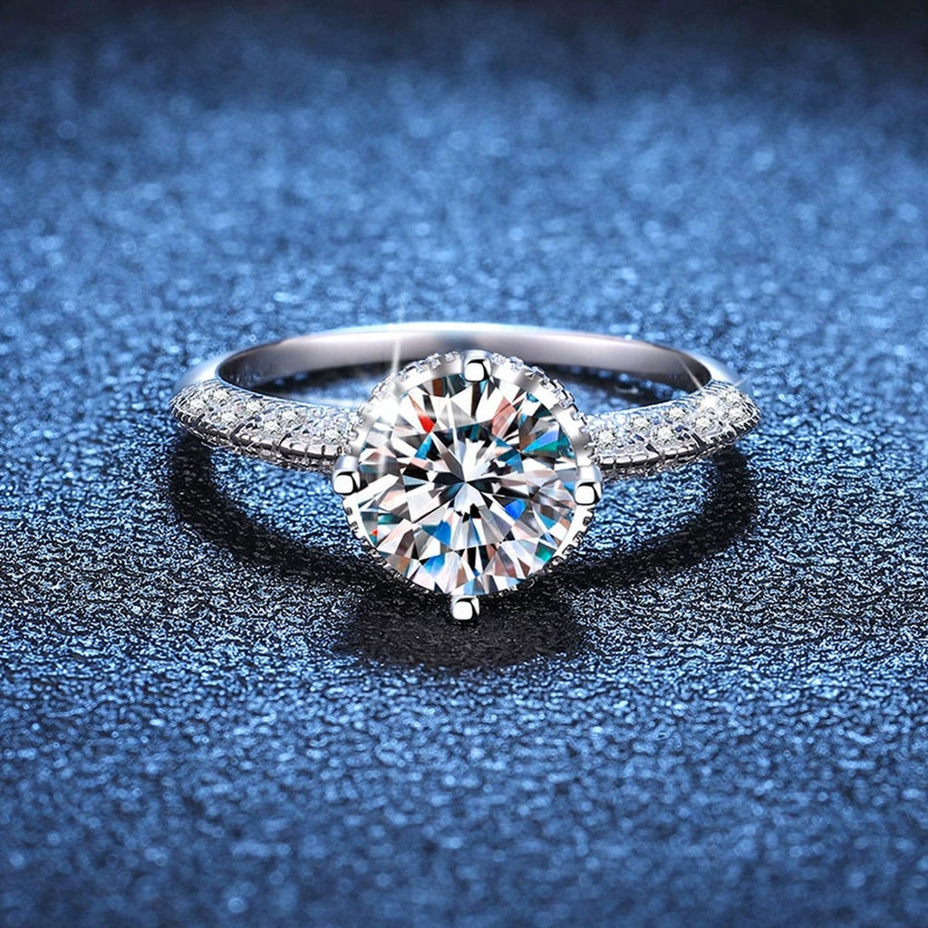 Round Moissanite Ring with Pink CZ blue background product view