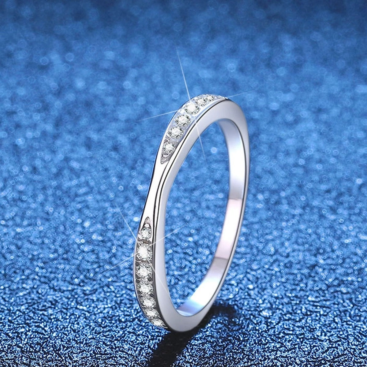 Slim Moissanite Band Ring blue background product view