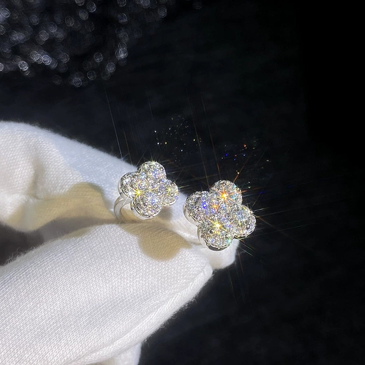 Adjustable Floral Moissanite Ring with CZ dark background detail view