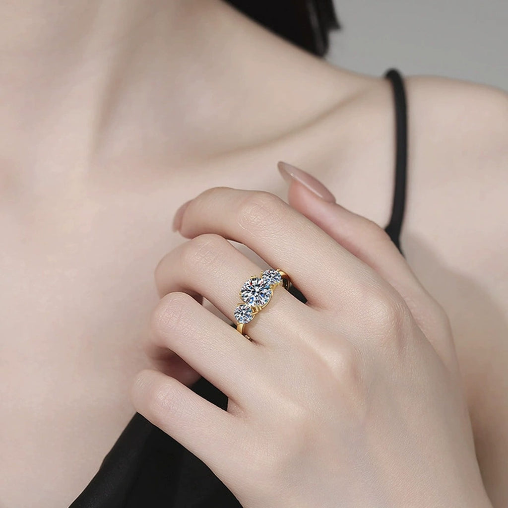 Three Stone Moissanite Ring in Yellow Gold-Plated S925 Sterling Silver worn on hand by model