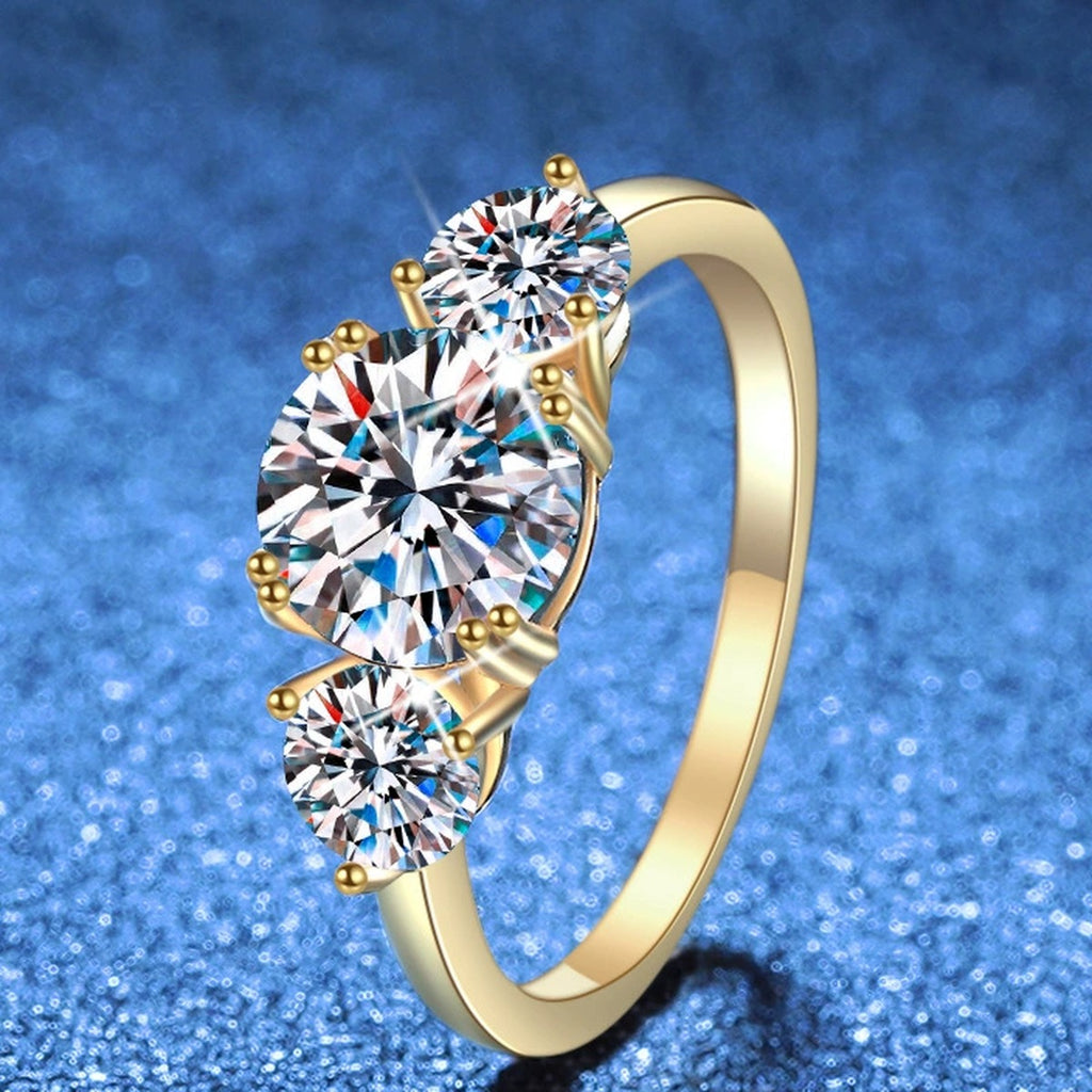 Three Stone Moissanite Ring in Yellow Gold-Plated S925 Sterling Silver blue background product view