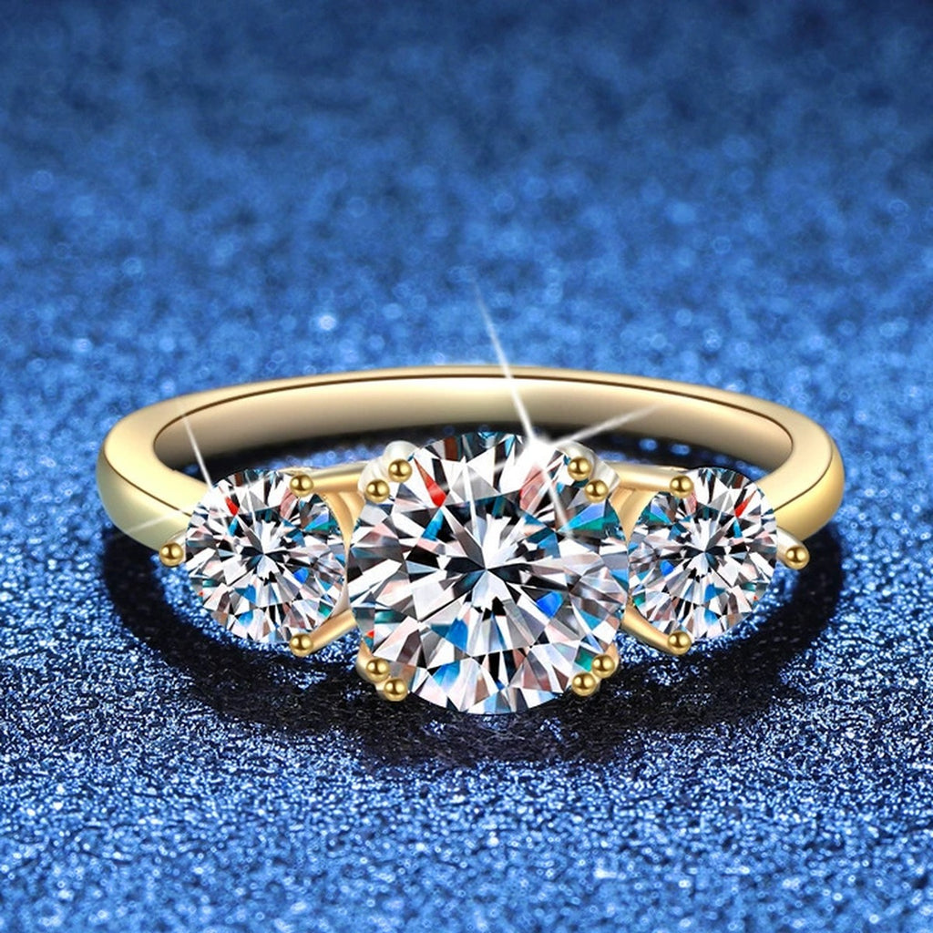 Three Stone Moissanite Ring in Yellow Gold-Plated S925 Sterling Silver blue background product view