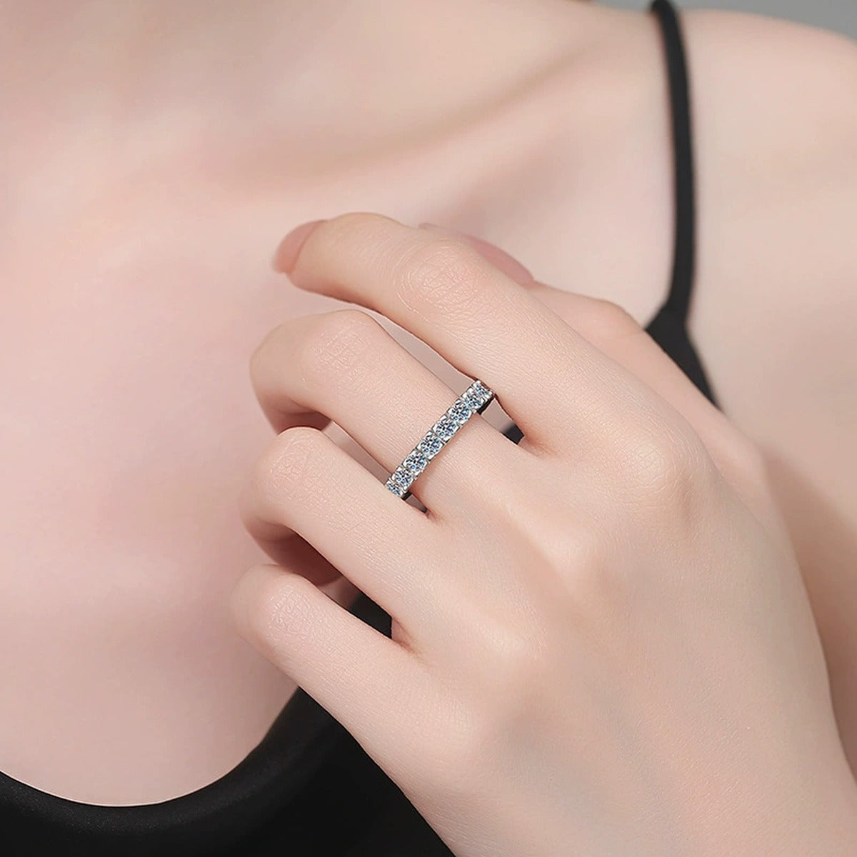 Full Eternity Round Moissanite Band Ring worn on hand by model