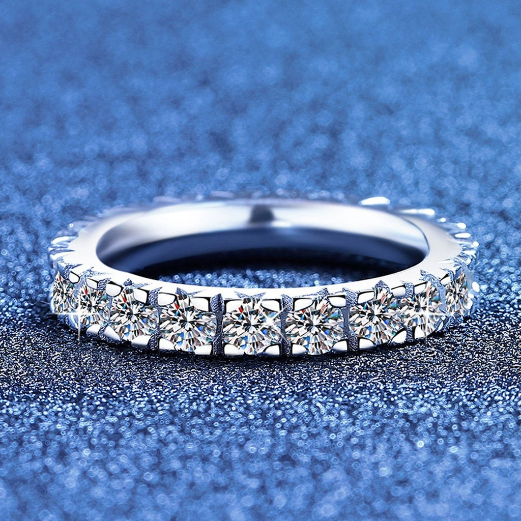 Full Eternity Round Moissanite Band Ring blue background product view