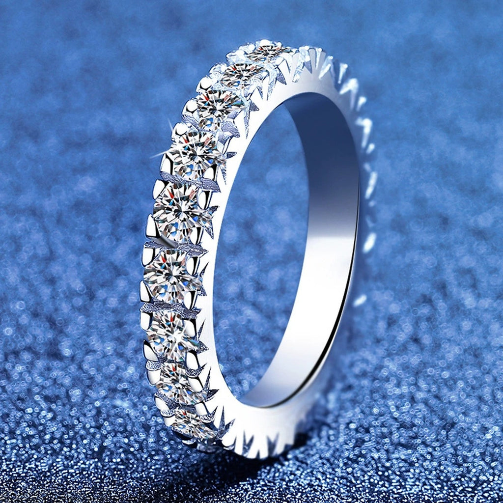 Full Eternity Round Moissanite Band Ring blue background product view