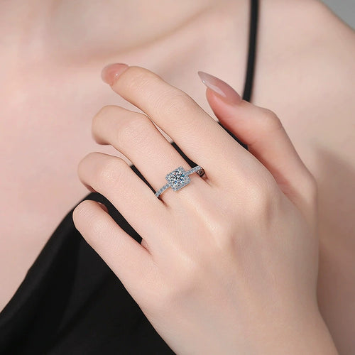Cushion Halo Moissanite Engagement Ring with CZ worn on hand by model