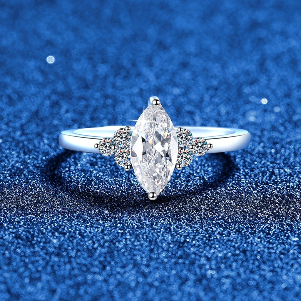 Marquise Moissanite Ring with CZ blue background product view