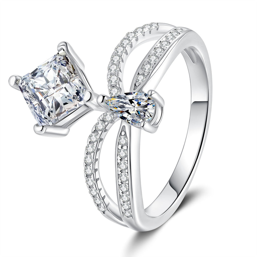 Radiant and Pear Moissanite Ring with CZ white background product image