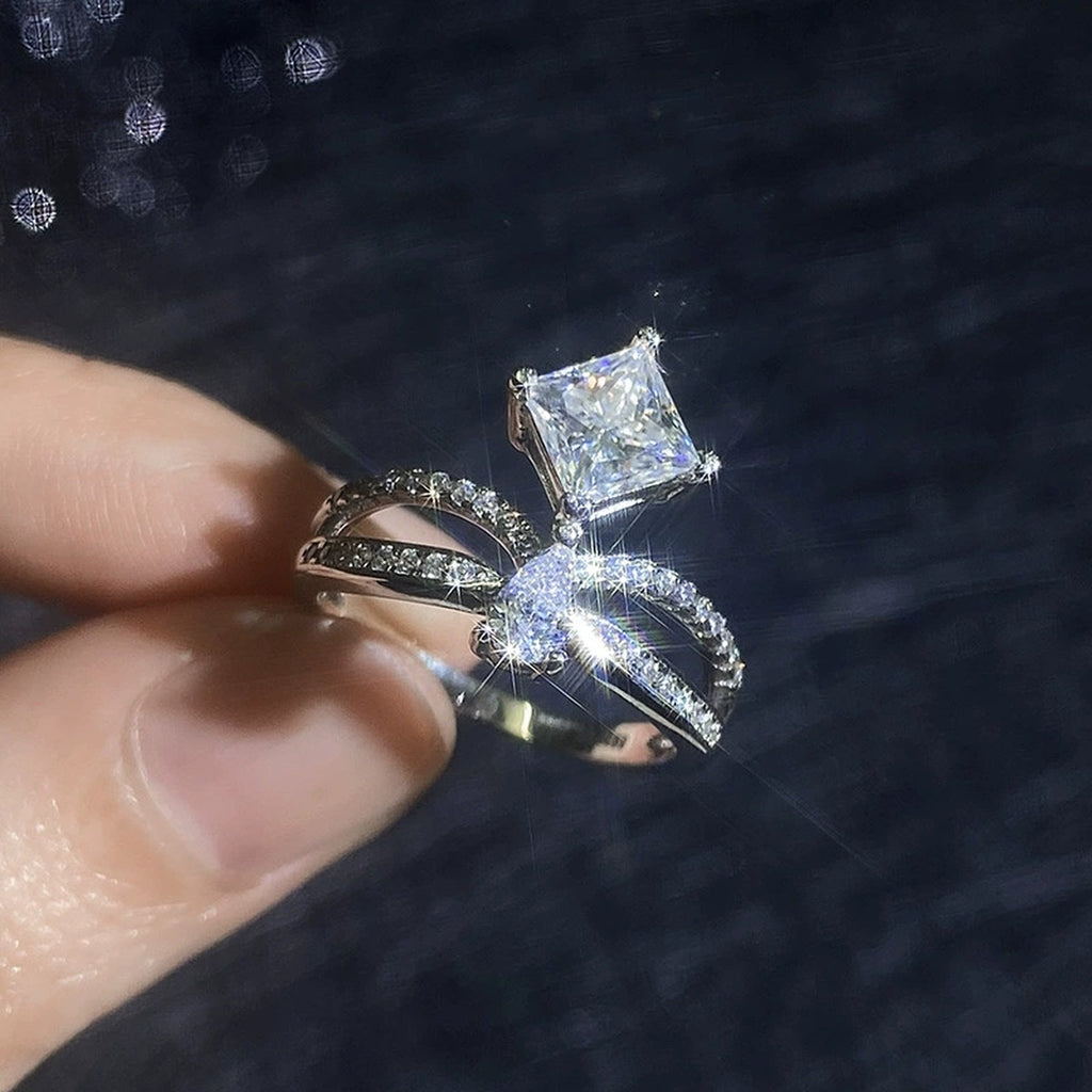 Radiant and Pear Moissanite Ring with CZ close-up product detail view