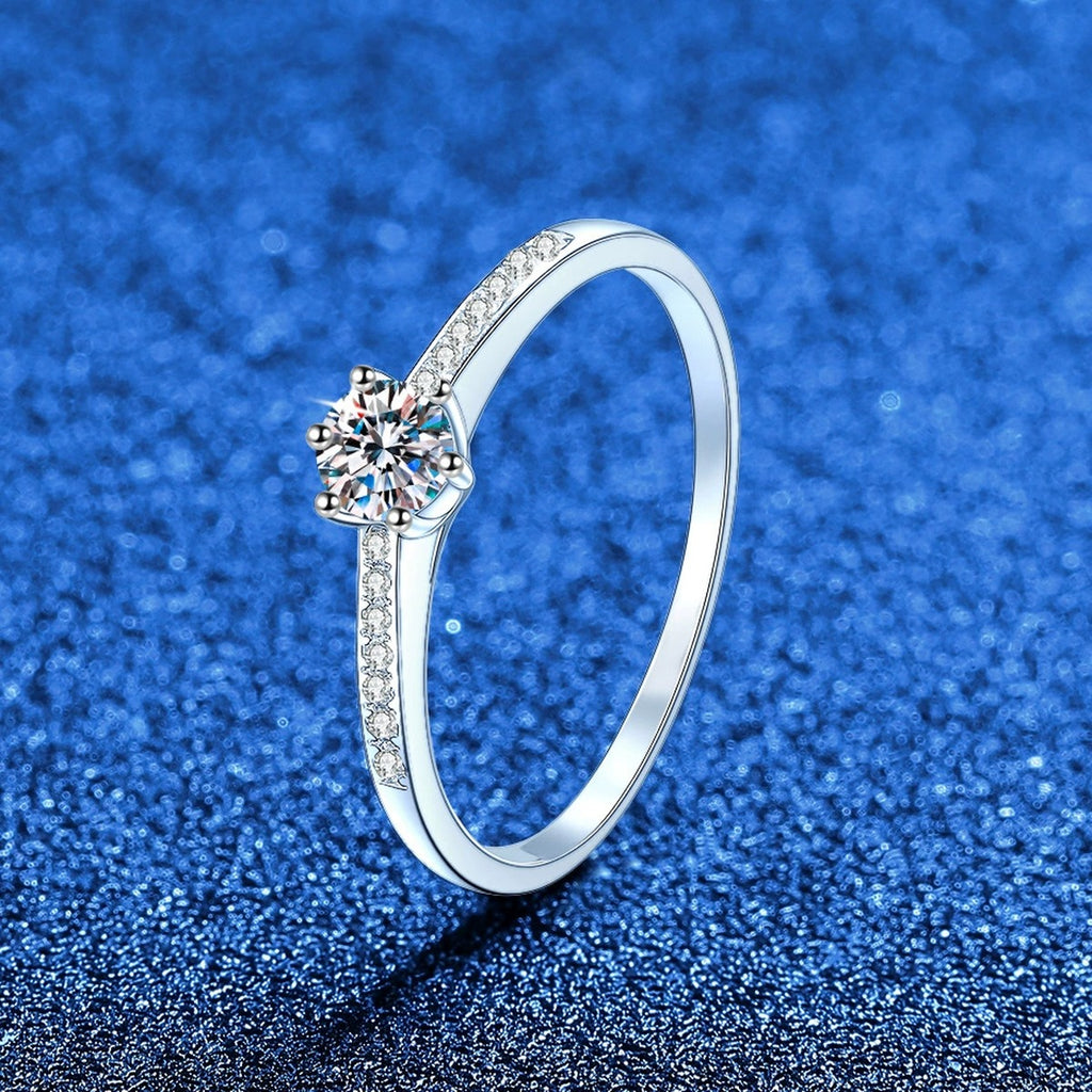 Round Moissanite Ring with CZ blue background product view