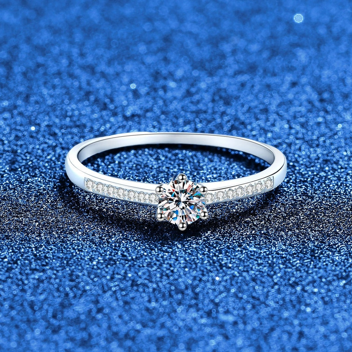 Round Moissanite Ring with CZ blue background product view