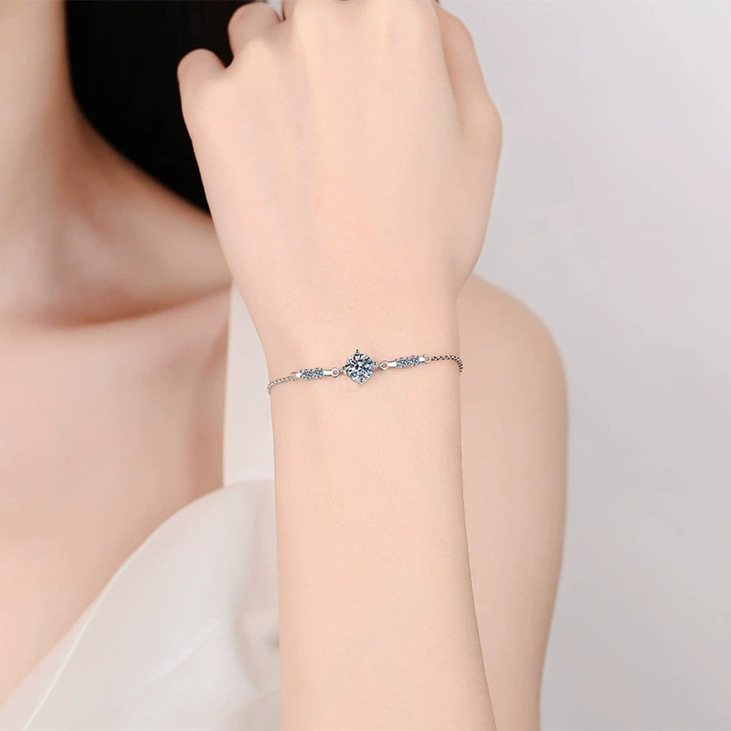 Round Moissanite Adjustable Chain Bracelet with CZ in White Gold-Plated S925 Sterling Silver worn on wrist model view showing scale and fit
