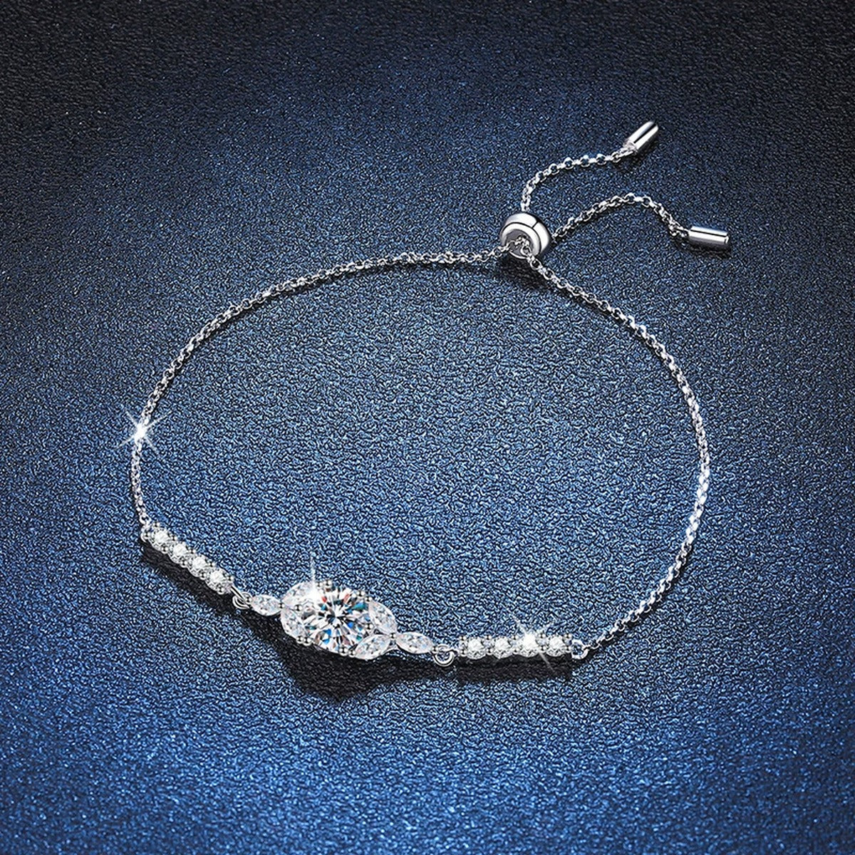 Oval Moissanite Adjustable Chain Bracelet with CZ in White Gold-Plated S925 Sterling Silver blue display scene showing bracelet sparkle and chain detail