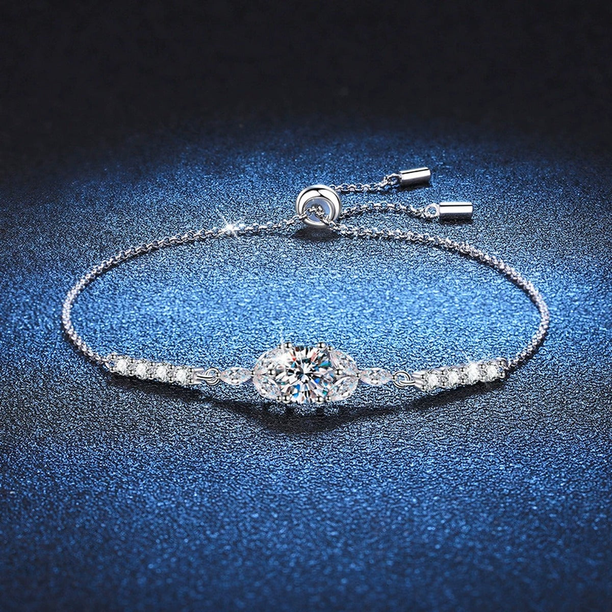 Oval Moissanite Adjustable Chain Bracelet with CZ in White Gold-Plated S925 Sterling Silver blue display scene showing bracelet sparkle and chain detail