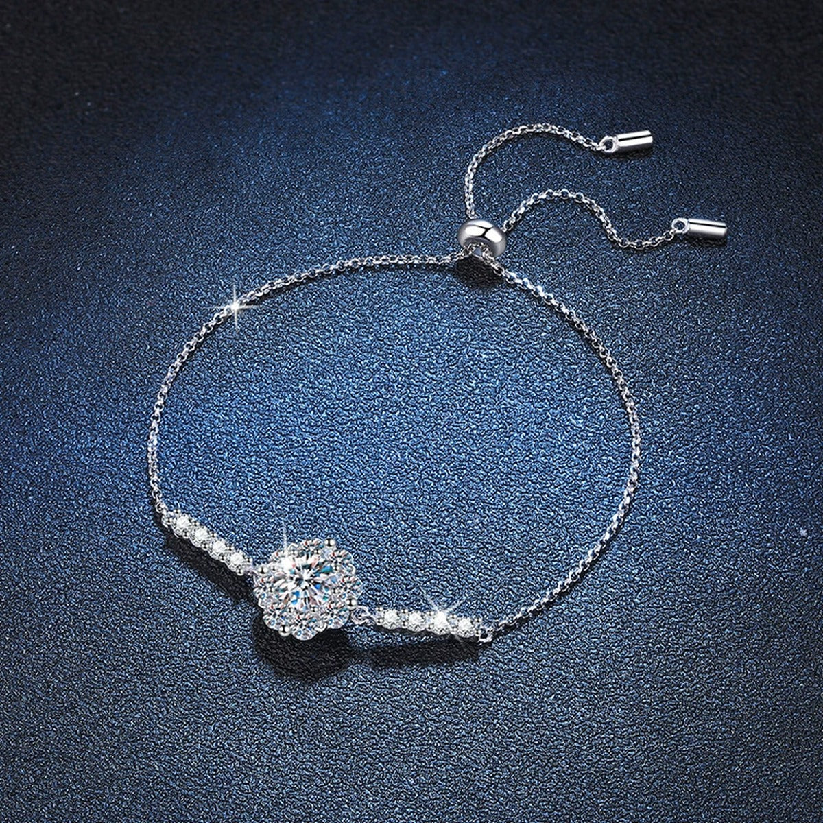 Halo Round Moissanite Adjustable Chain Bracelet with CZ in White Gold-Plated S925 Sterling Silver blue display scene showing bracelet sparkle and chain detail