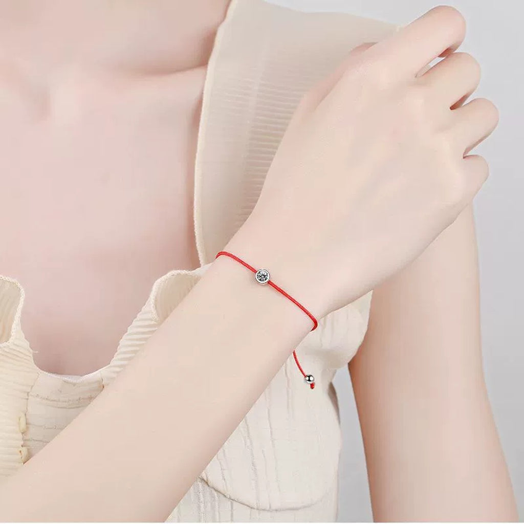 Red Cord Moissanite Adjustable Bracelet in Gold-Plated S925 Sterling Silver worn on wrist model view showing scale and fit
