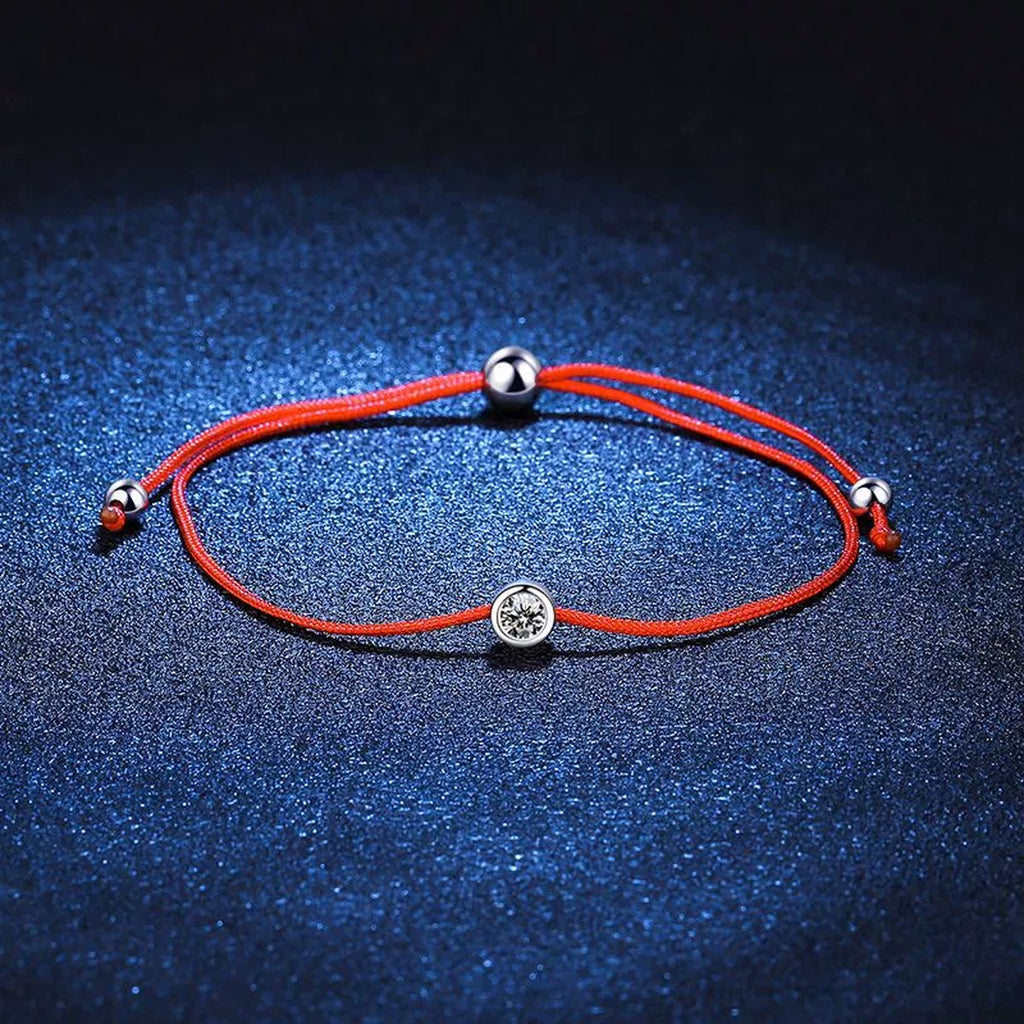 Red Cord Moissanite Adjustable Bracelet in Gold-Plated S925 Sterling Silver blue display scene showing bracelet sparkle and chain detail