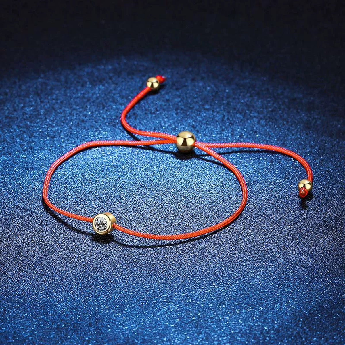 Red Cord Moissanite Adjustable Bracelet in Gold-Plated S925 Sterling Silver blue display scene showing bracelet sparkle and chain detail