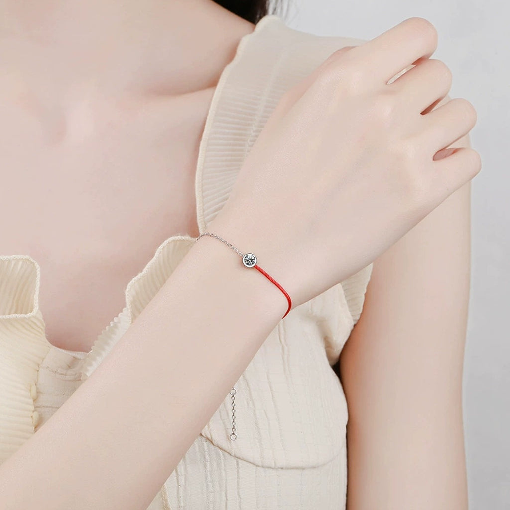 Two-Tone Red Cord Moissanite Adjustable Bracelet in White Gold-Plated S925 Sterling Silver worn on wrist model view showing scale and fit