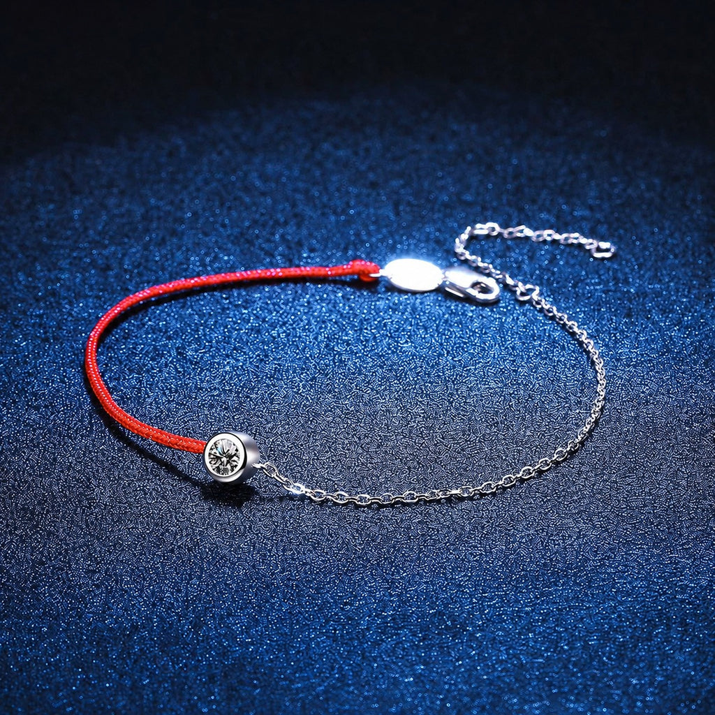 Two-Tone Red Cord Moissanite Adjustable Bracelet in White Gold-Plated S925 Sterling Silver blue display scene showing bracelet sparkle and chain detail