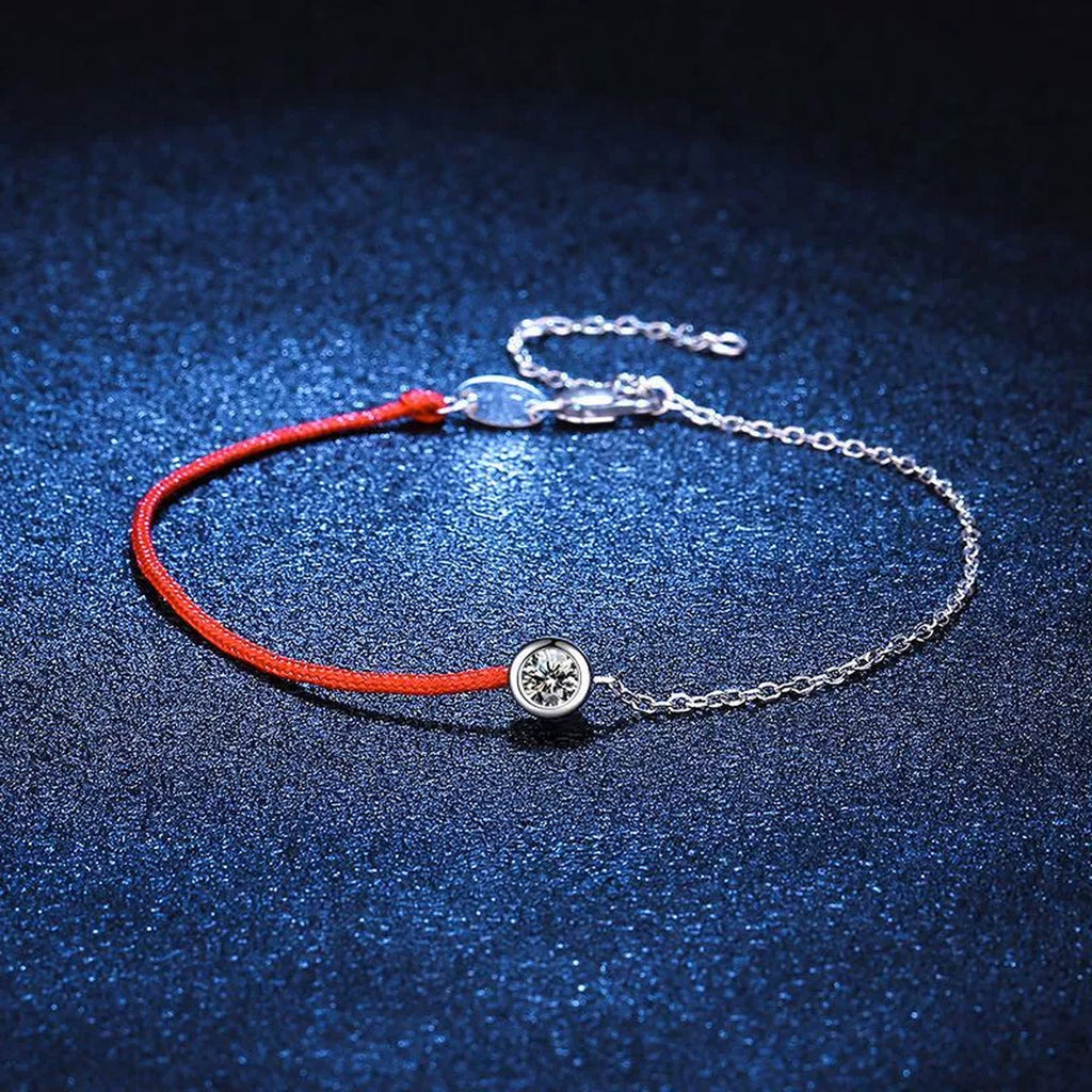 Two-Tone Red Cord Moissanite Adjustable Bracelet in White Gold-Plated S925 Sterling Silver blue display scene showing bracelet sparkle and chain detail