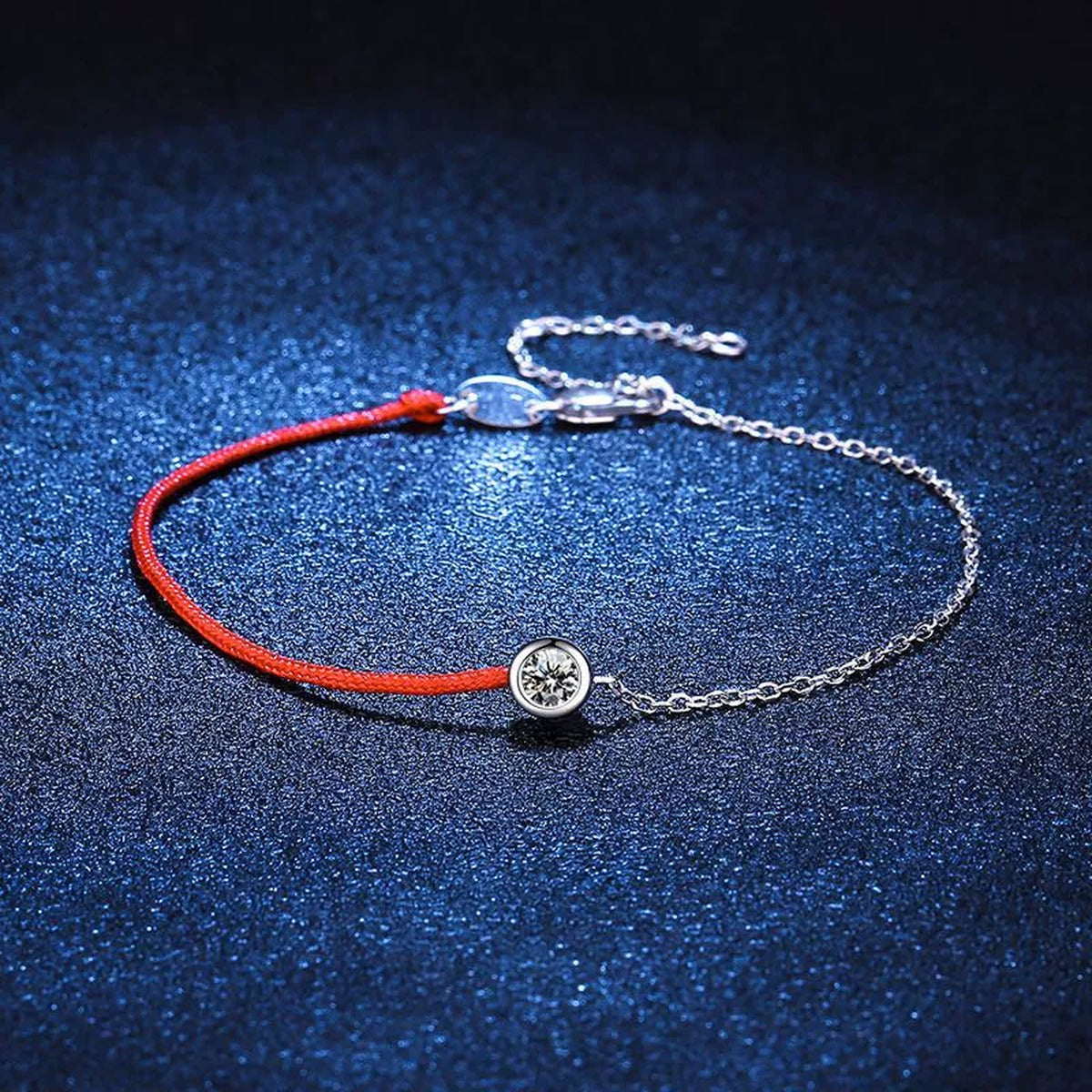 Two-Tone Red Cord Moissanite Adjustable Bracelet in White Gold-Plated S925 Sterling Silver blue display scene showing bracelet sparkle and chain detail