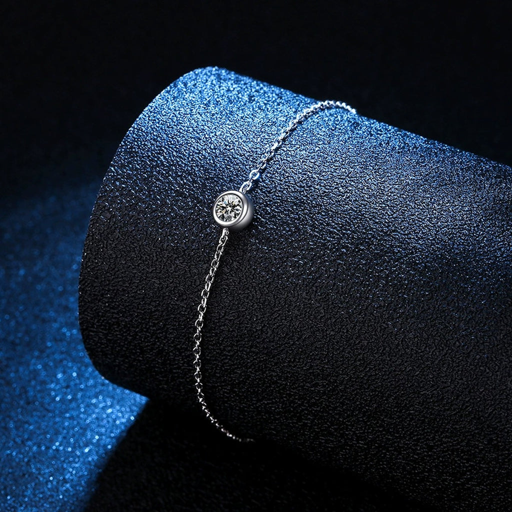 Beaded Moissanite Chain Bracelet in White Gold-Plated S925 Sterling Silver blue display scene showing bracelet sparkle and chain detail