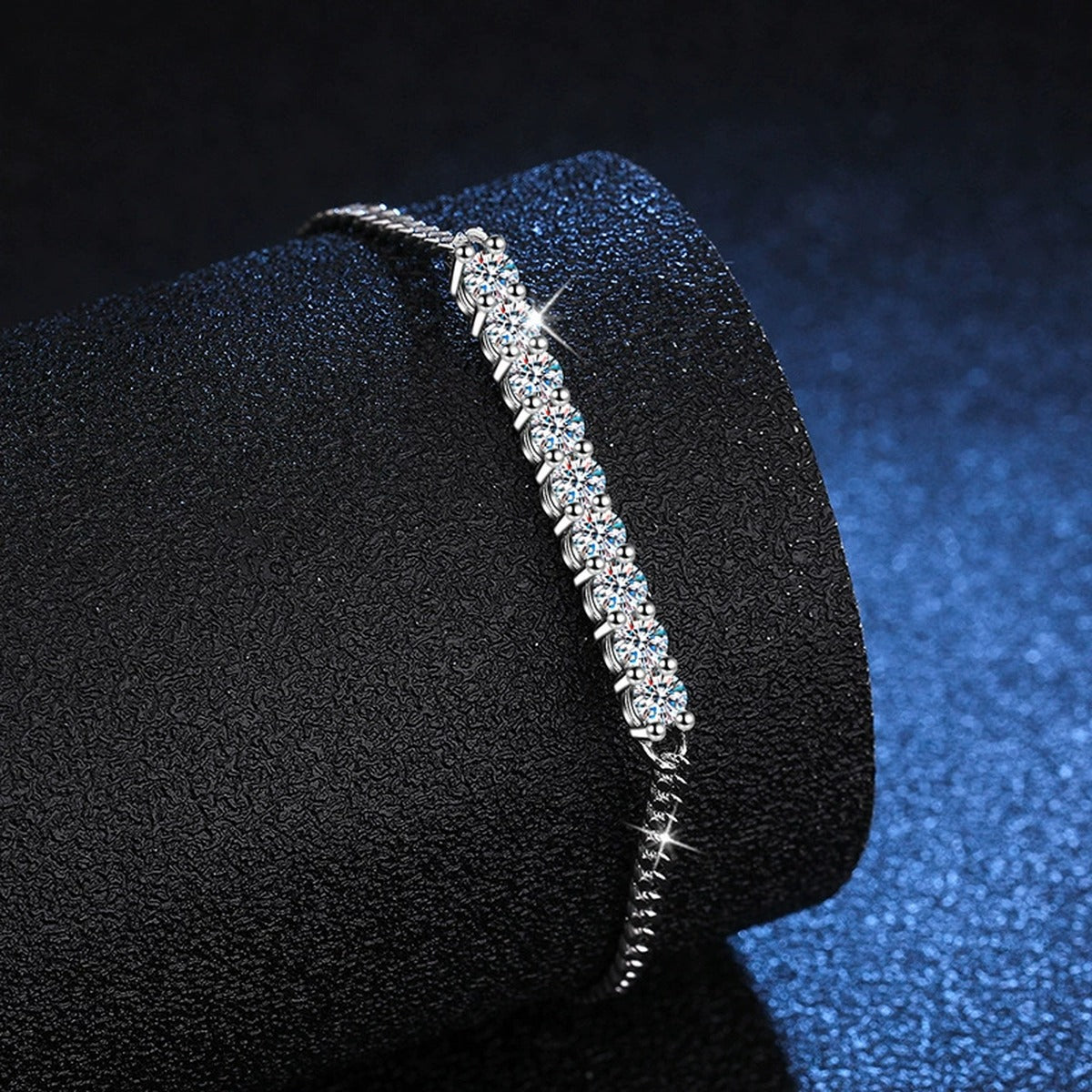 Moissanite Bar Tennis Bracelet in White Gold-Plated S925 Sterling Silver blue display scene showing bracelet sparkle and chain detail