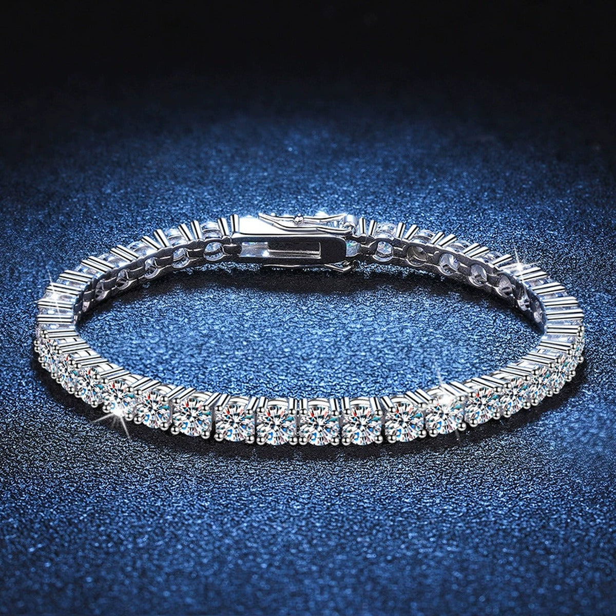 Moissanite Tennis Bracelet in White Gold-Plated S925 Sterling Silver blue display scene showing bracelet sparkle and chain detail