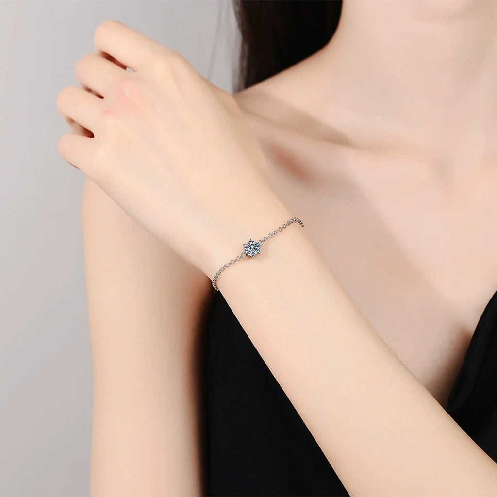 Starburst Moissanite Chain Bracelet in White Gold-Plated S925 Sterling Silver worn on wrist model view showing scale and fit
