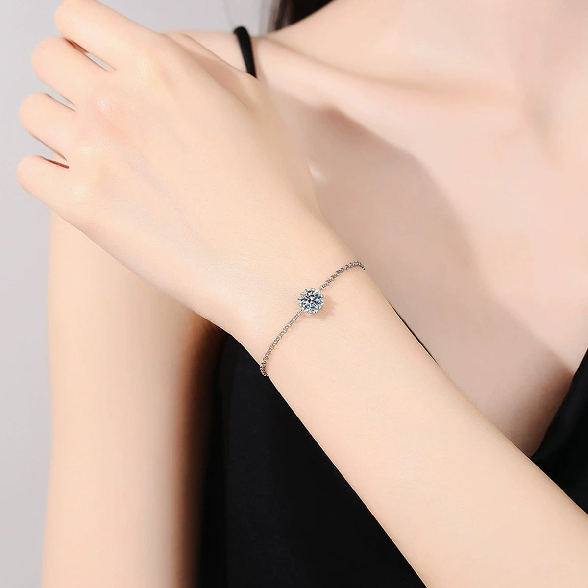 Round Halo Moissanite Chain Bracelet with CZ in White Gold-Plated S925 Sterling Silver worn on wrist model view showing scale and fit