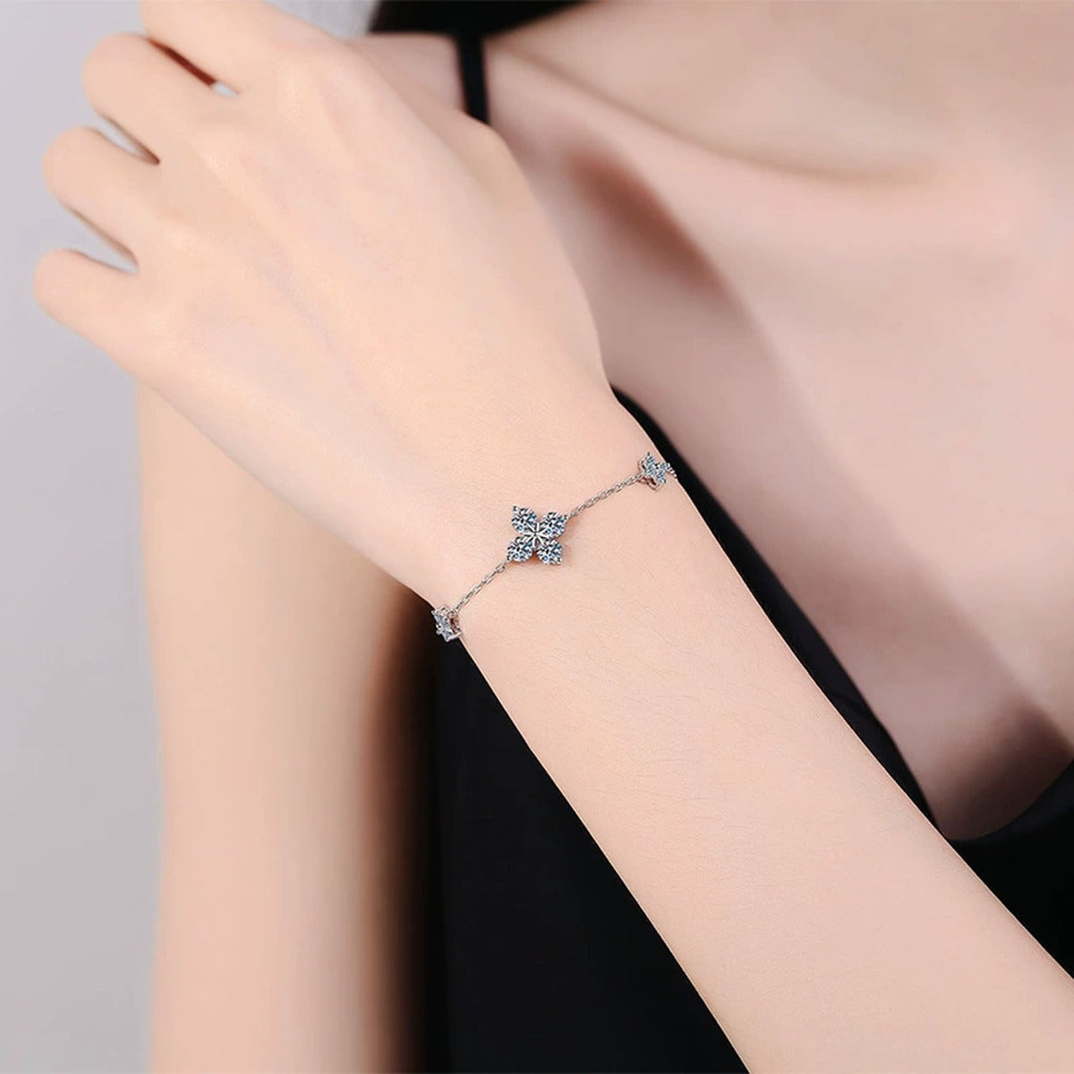 Floral Moissanite Chain Bracelet with CZ in White Gold-Plated S925 Sterling Silver worn on wrist model view showing scale and fit