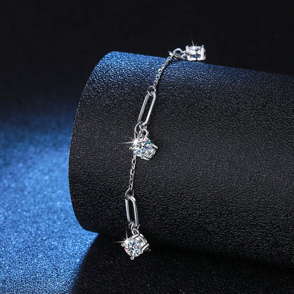 Multi-Charm Moissanite Chain Bracelet in White Gold-Plated S925 Sterling Silver blue display scene showing bracelet sparkle and chain detail