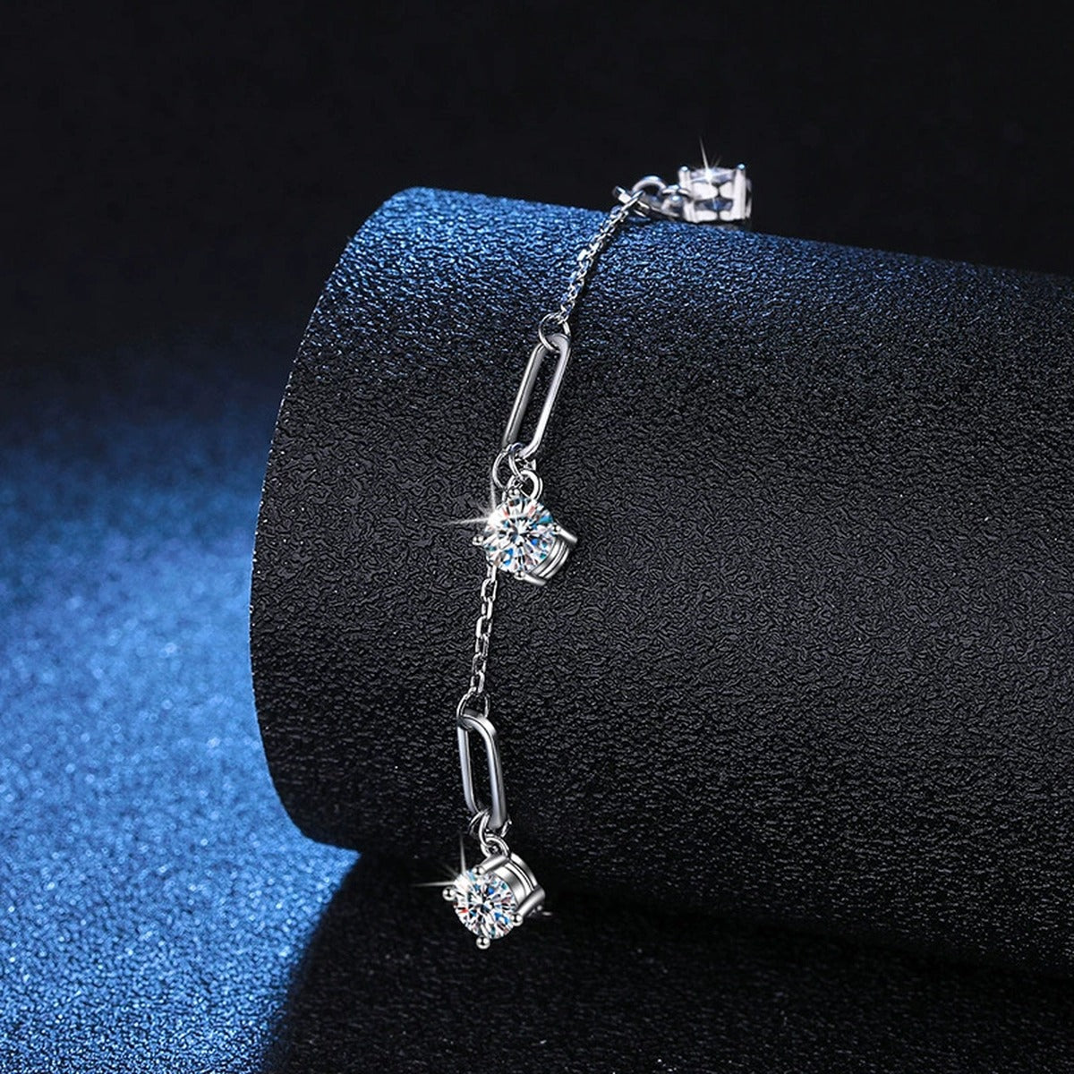 Multi-Charm Moissanite Chain Bracelet in White Gold-Plated S925 Sterling Silver blue display scene showing bracelet sparkle and chain detail