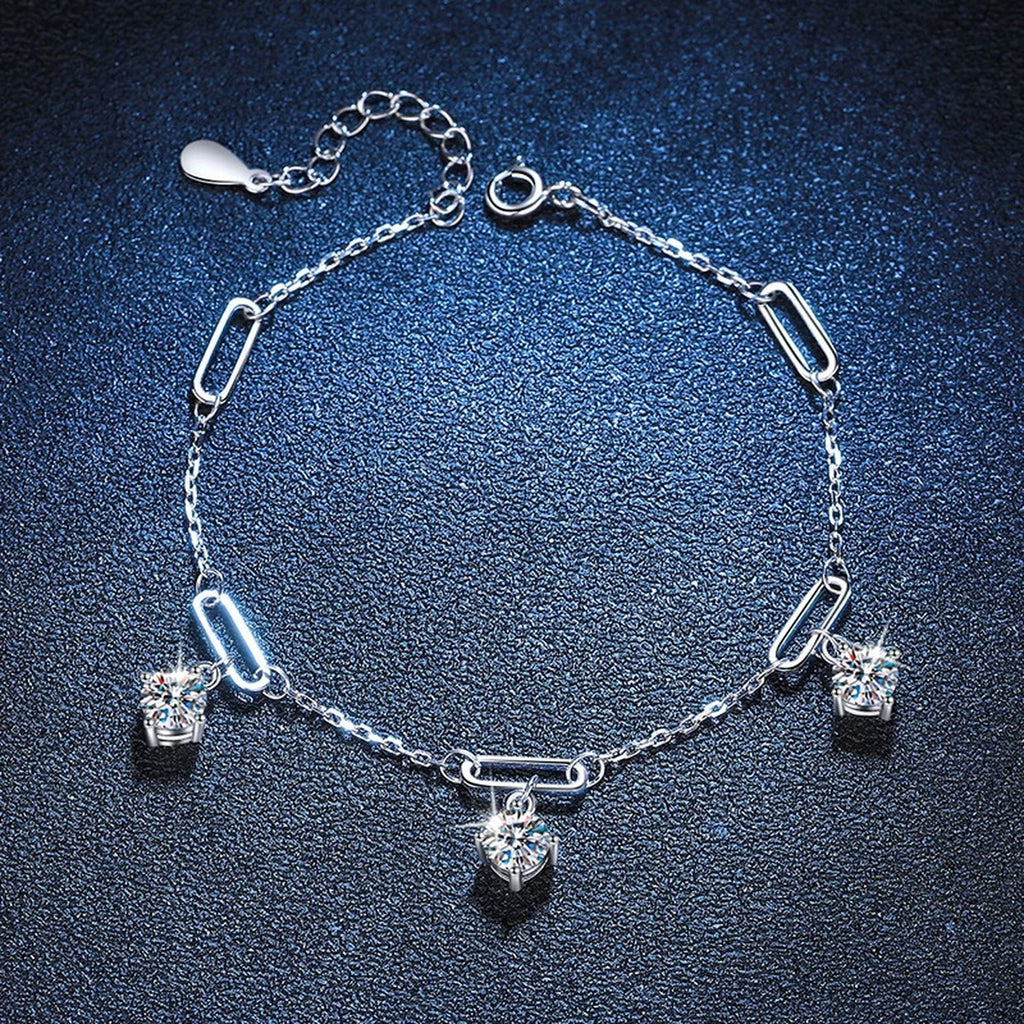 Multi-Charm Moissanite Chain Bracelet in White Gold-Plated S925 Sterling Silver blue display scene showing bracelet sparkle and chain detail