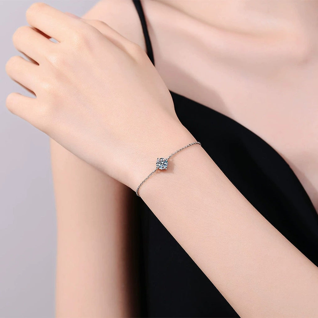 Round Moissanite Adjustable Chain Bracelet in White Gold-Plated S925 Sterling Silver worn on wrist model view showing scale and fit