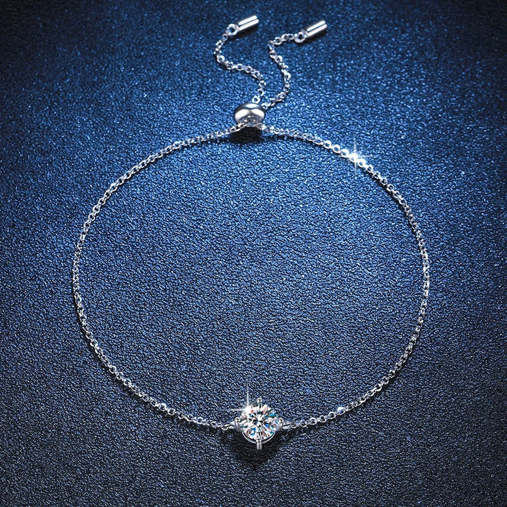 Round Moissanite Adjustable Chain Bracelet in White Gold-Plated S925 Sterling Silver blue display scene showing bracelet sparkle and chain detail