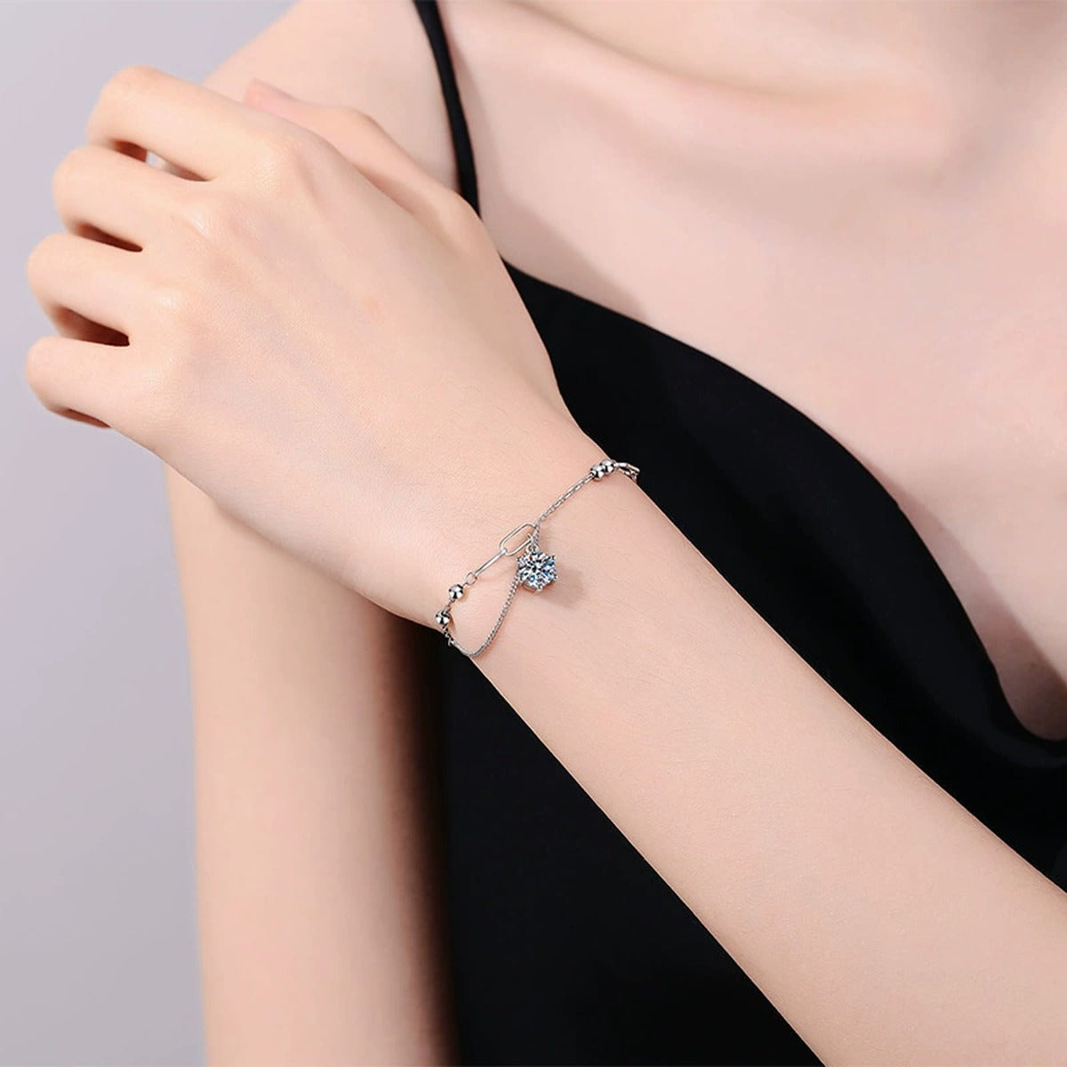Drop Moissanite Chain Bracelet in White Gold-Plated S925 Sterling Silver worn on wrist model view showing scale and fit