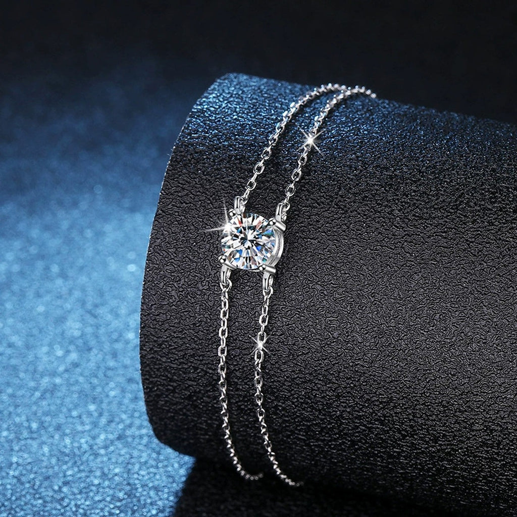 Kite Moissanite Chain Bracelet in White Gold-Plated S925 Sterling Silver blue display scene showing bracelet sparkle and chain detail