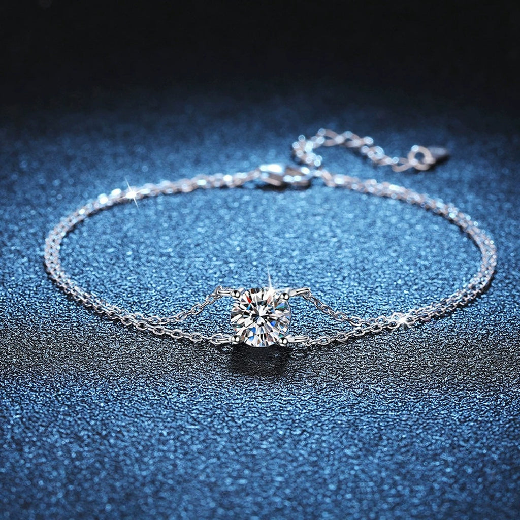 Kite Moissanite Chain Bracelet in White Gold-Plated S925 Sterling Silver blue display scene showing bracelet sparkle and chain detail