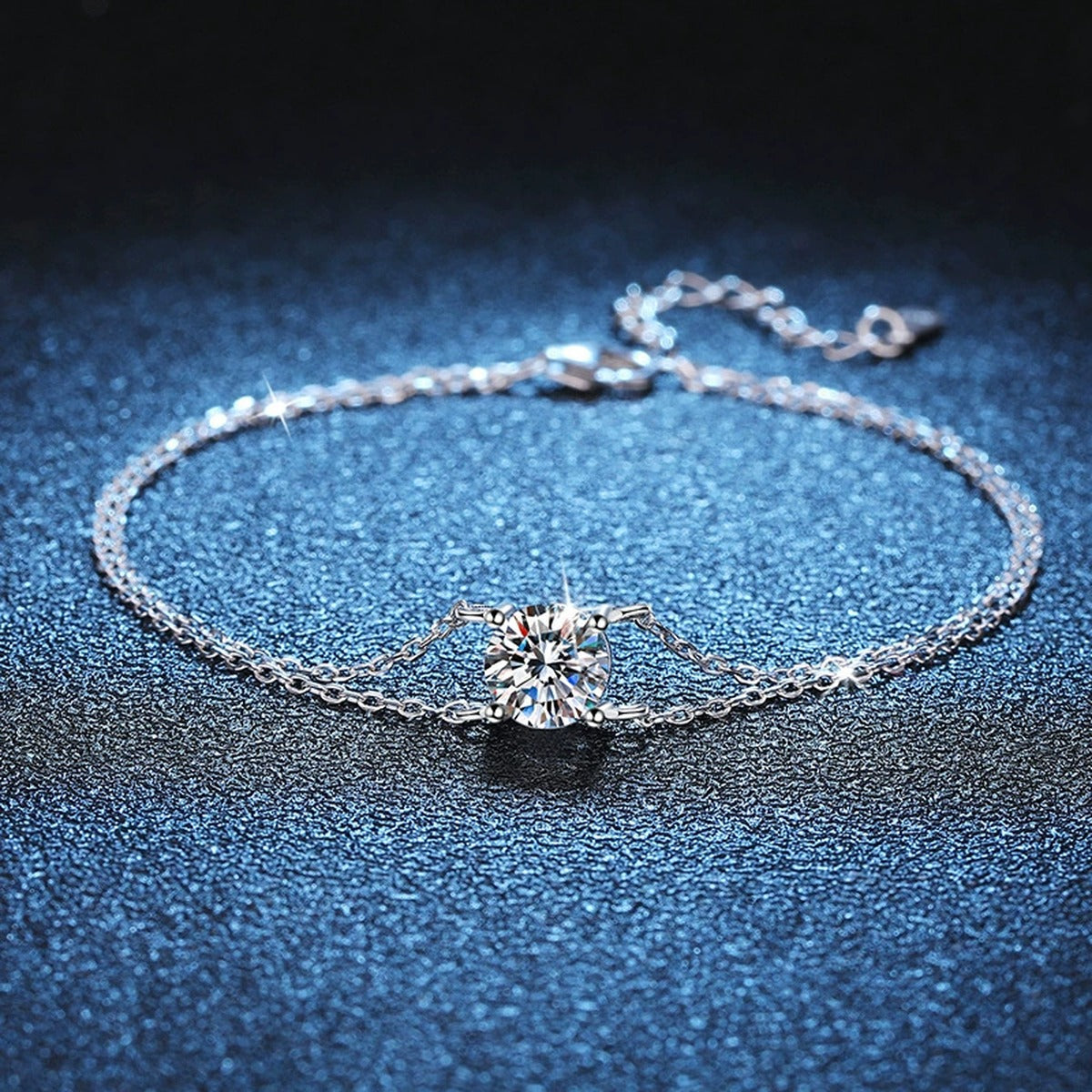 Kite Moissanite Chain Bracelet in White Gold-Plated S925 Sterling Silver blue display scene showing bracelet sparkle and chain detail