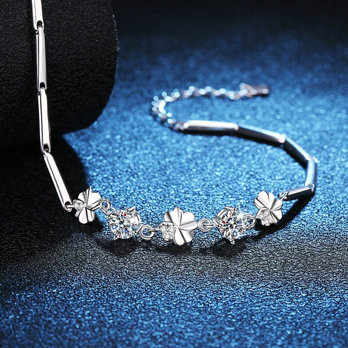 Graduated Moissanite Chain Bracelet with CZ in White Gold-Plated S925 Sterling Silver blue display scene showing bracelet sparkle and chain detail