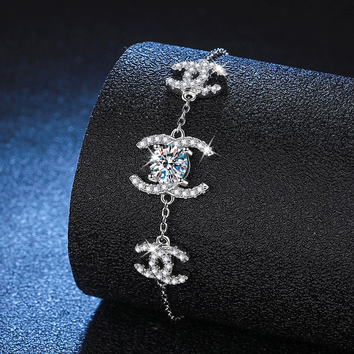 Butterfly Moissanite Chain Bracelet with CZ in White Gold-Plated S925 Sterling Silver blue display scene showing bracelet sparkle and chain detail