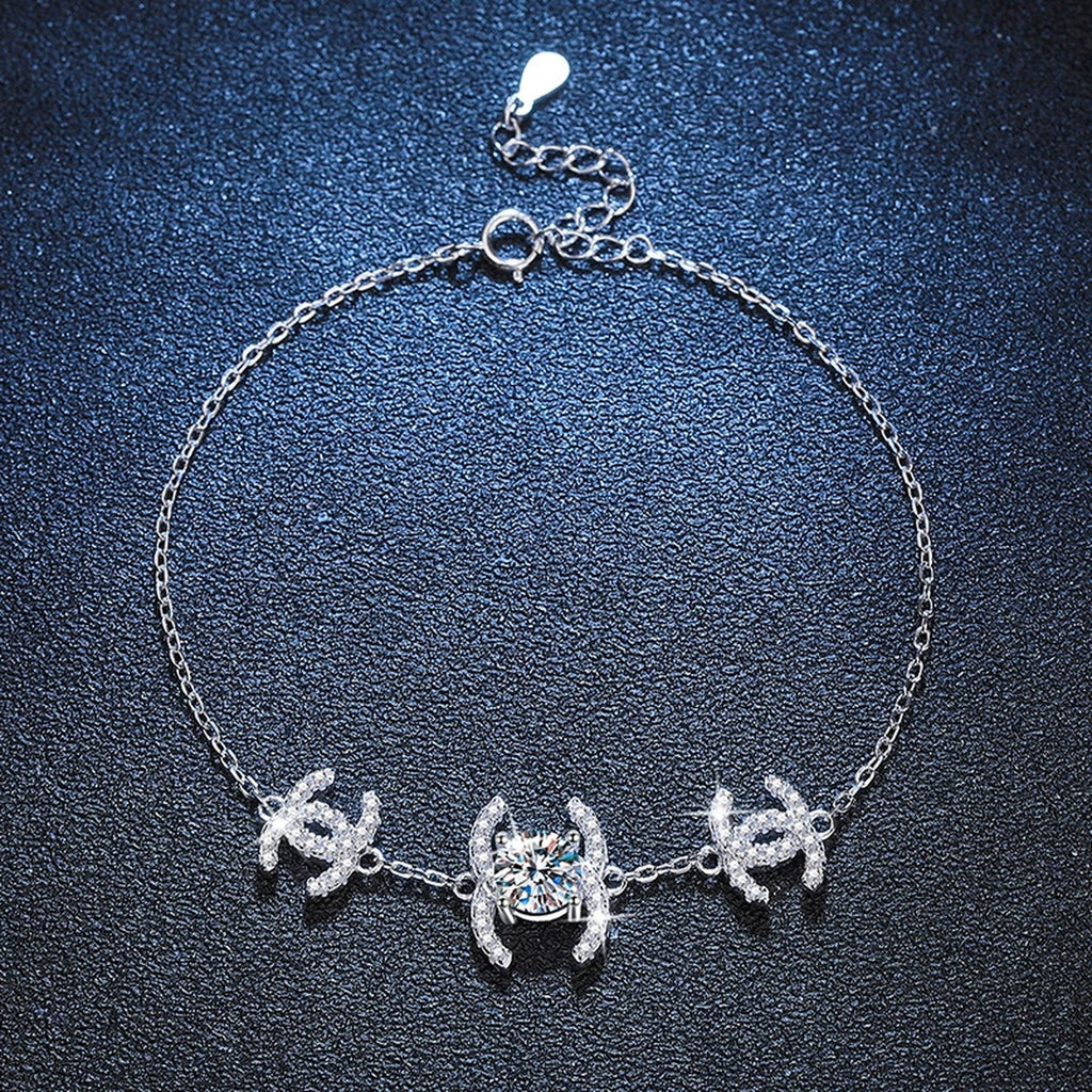 Butterfly Moissanite Chain Bracelet with CZ in White Gold-Plated S925 Sterling Silver blue display scene showing bracelet sparkle and chain detail