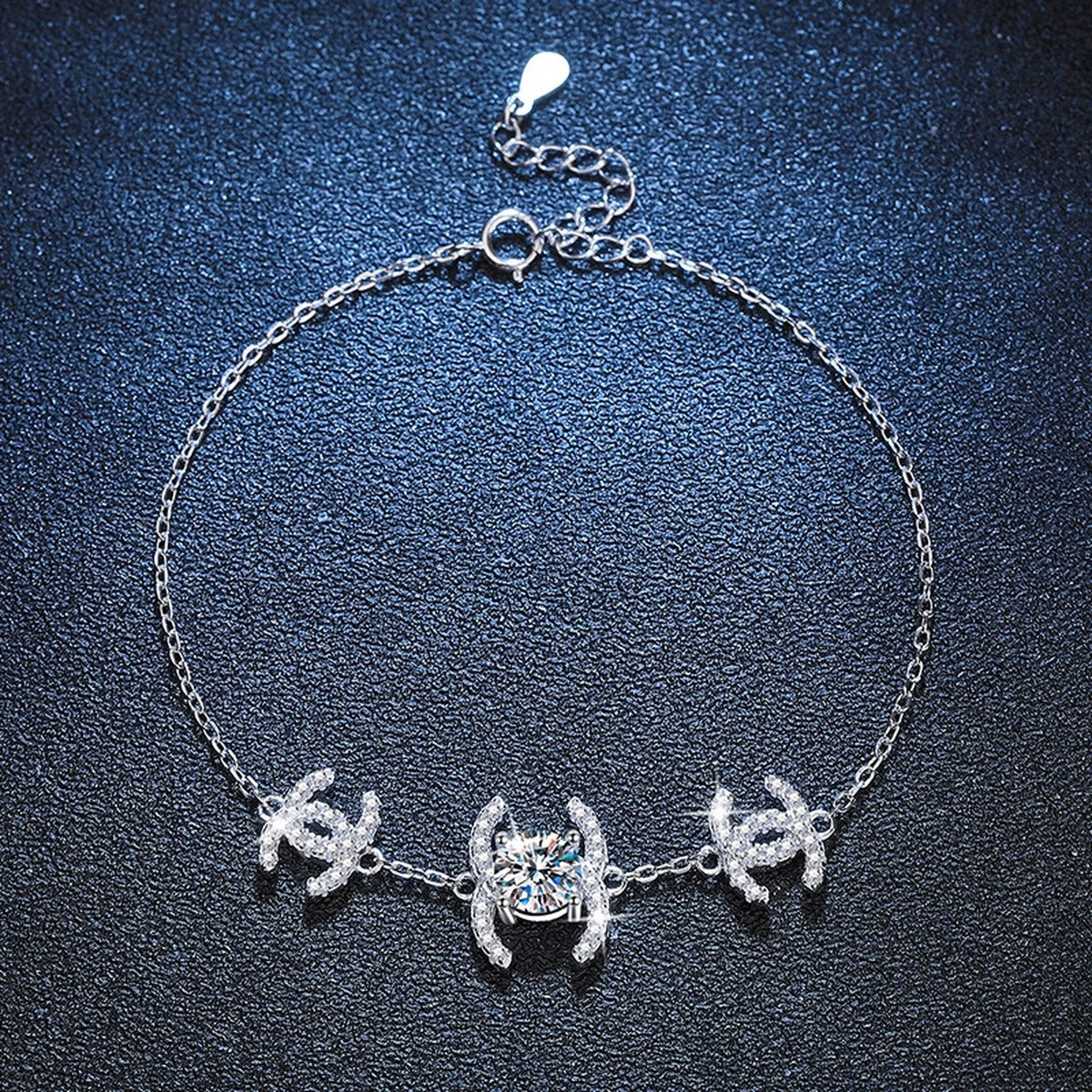 Butterfly Moissanite Chain Bracelet with CZ in White Gold-Plated S925 Sterling Silver blue display scene showing bracelet sparkle and chain detail