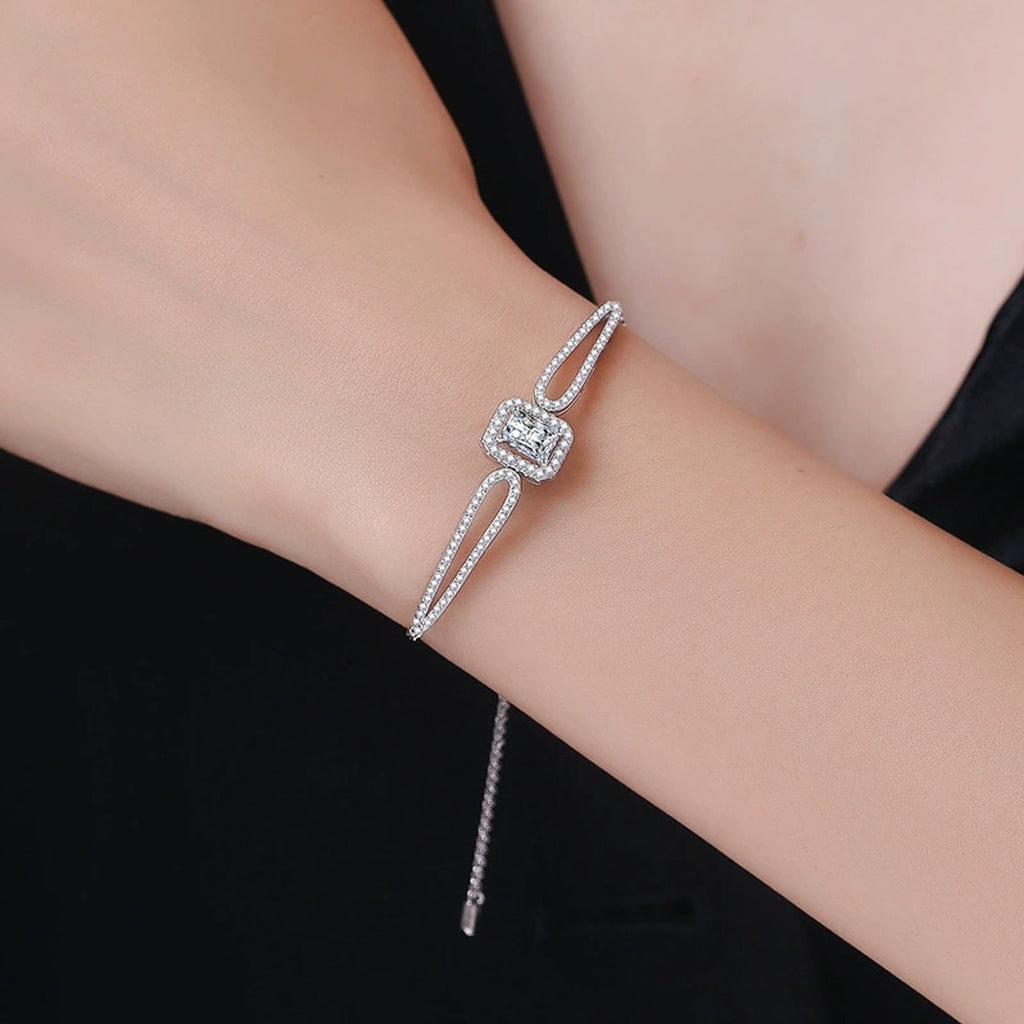Pear Moissanite Adjustable Bangle Bracelet with CZ in White Gold-Plated S925 Sterling Silver worn on wrist model view showing scale and fit