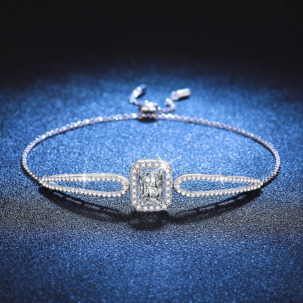 Pear Moissanite Adjustable Bangle Bracelet with CZ in White Gold-Plated S925 Sterling Silver blue display scene showing bracelet sparkle and chain detail