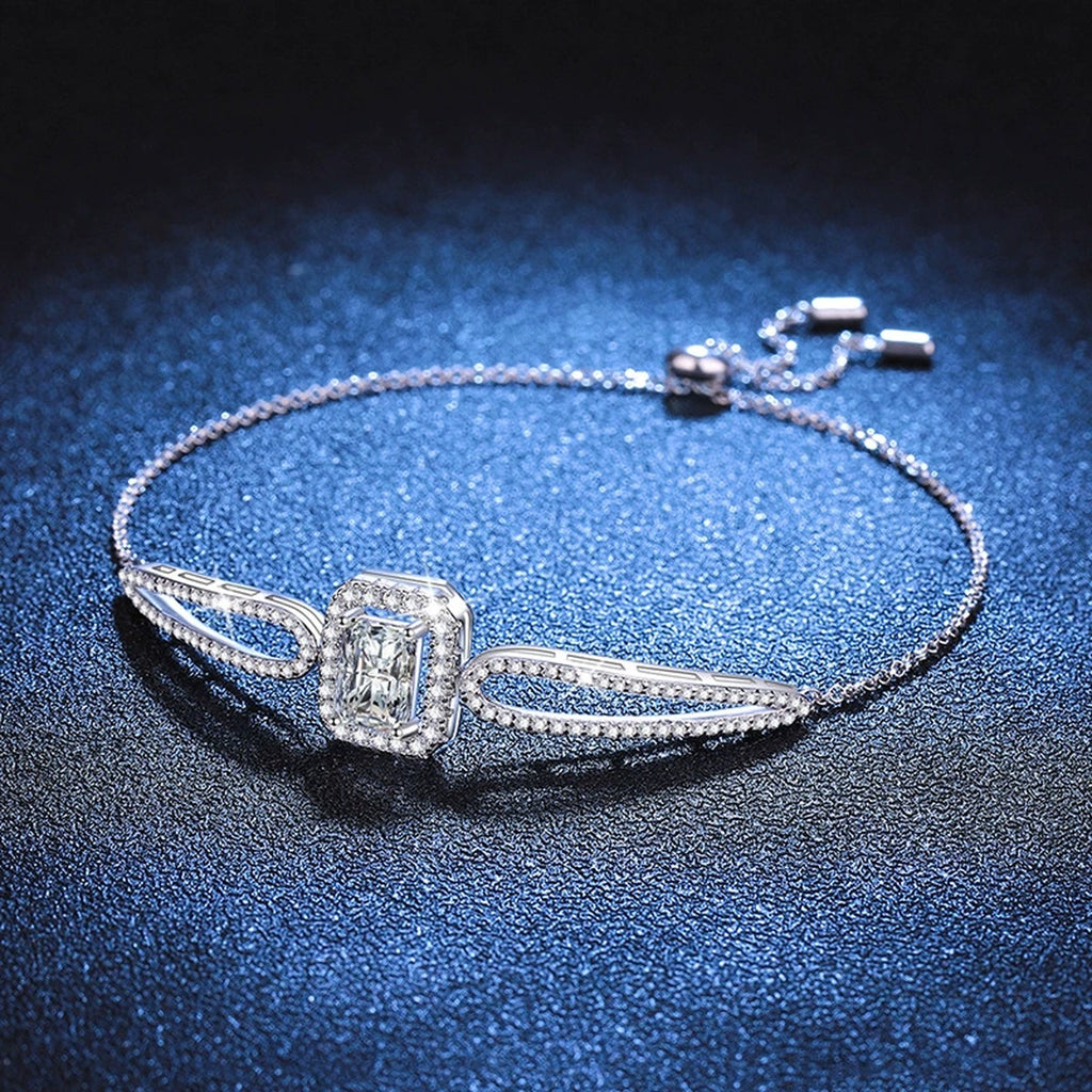 Pear Moissanite Adjustable Bangle Bracelet with CZ in White Gold-Plated S925 Sterling Silver blue display scene showing bracelet sparkle and chain detail